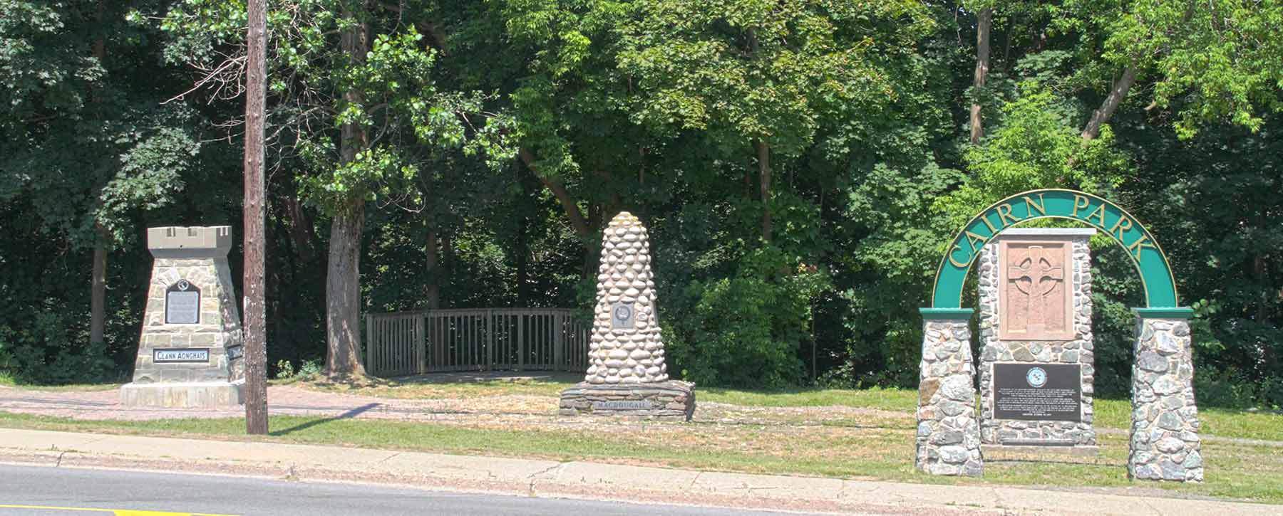 The Cairn Park entrance and Clan MacInness Cairn